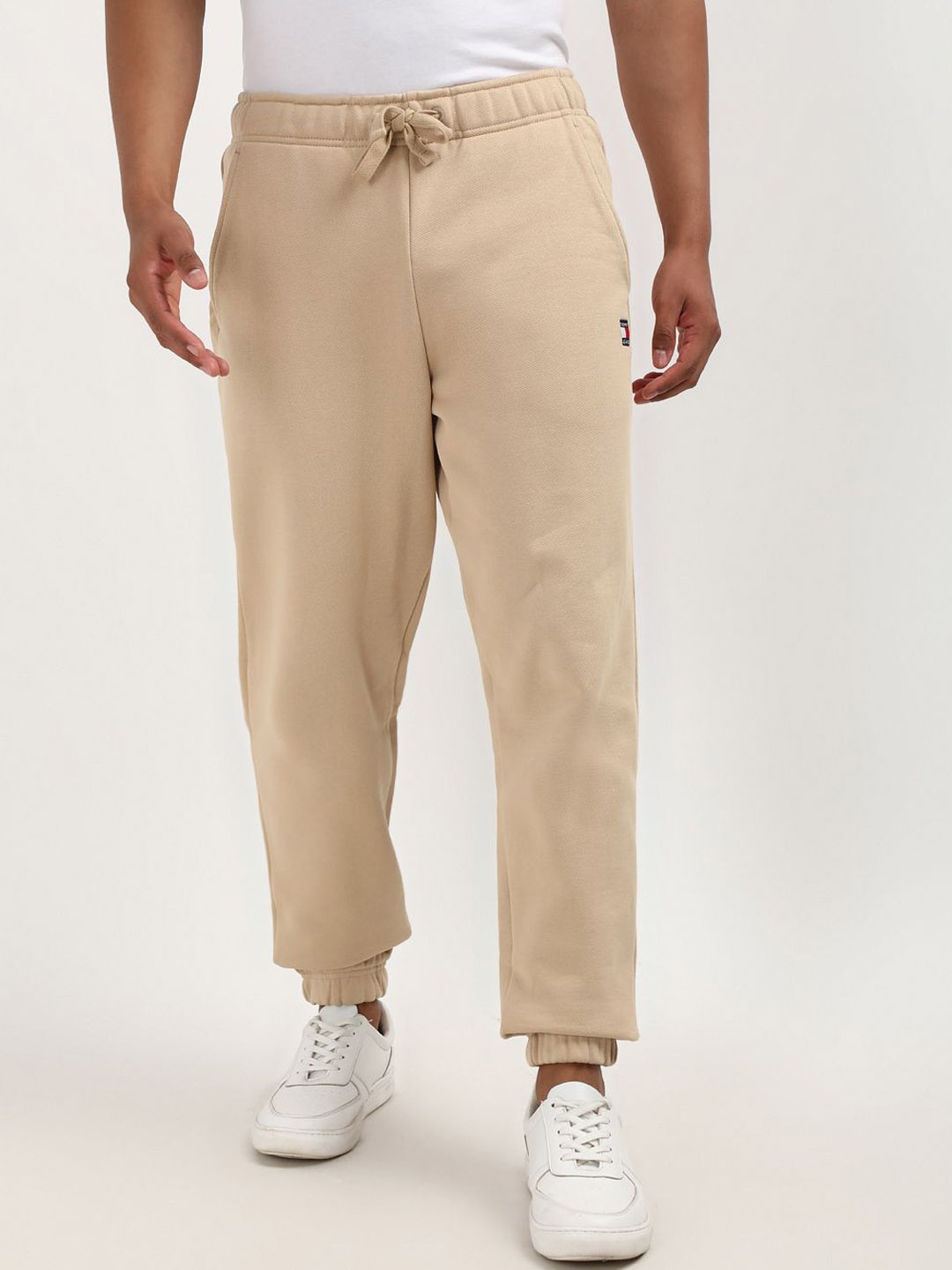 

Tommy Hilfiger Men Pure Cotton Mid Rise Joggers, Beige