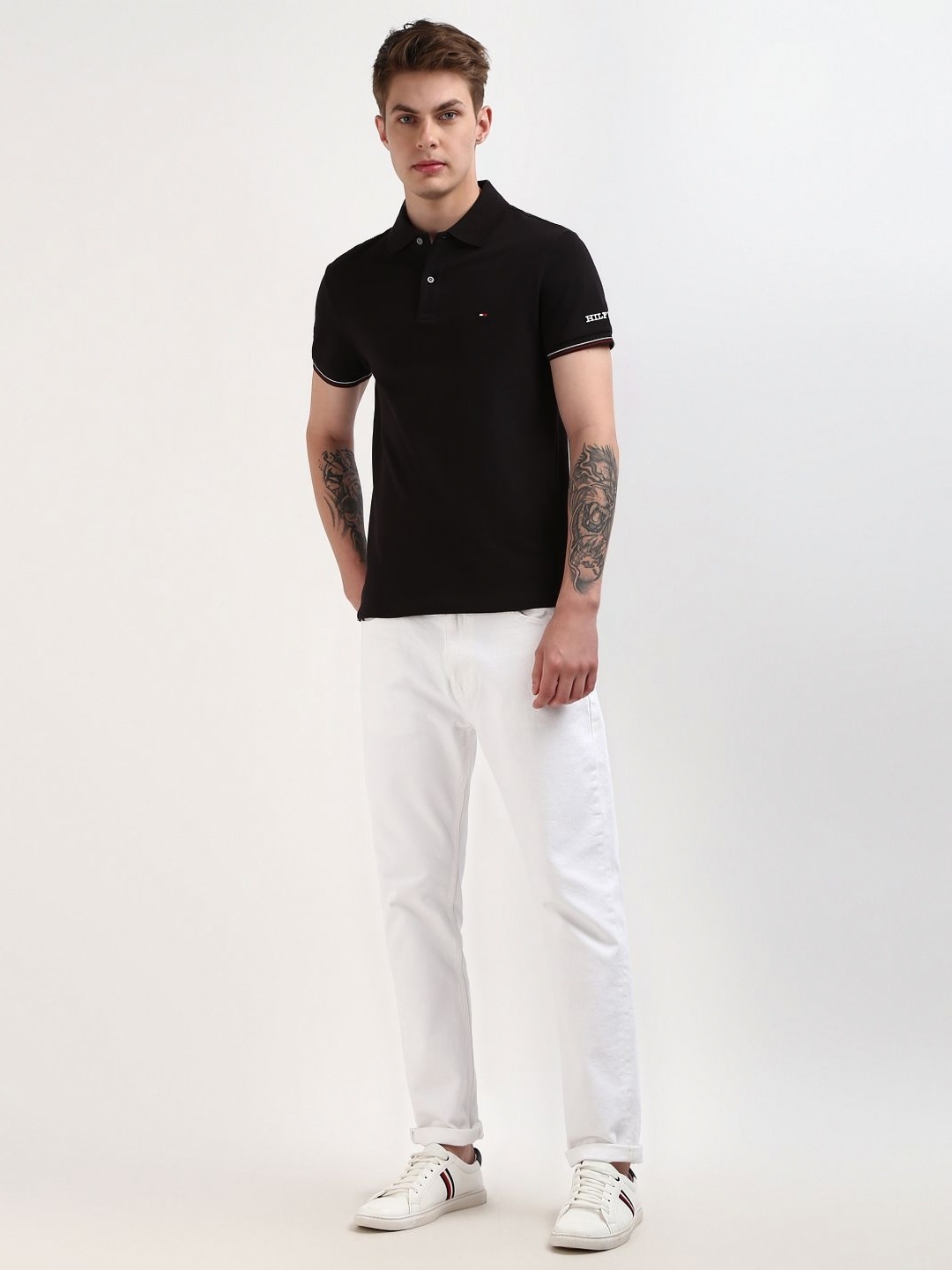 

Tommy Hilfiger Men Solid Polo Collar Organic Cotton Slim Fit T-shirt, Black