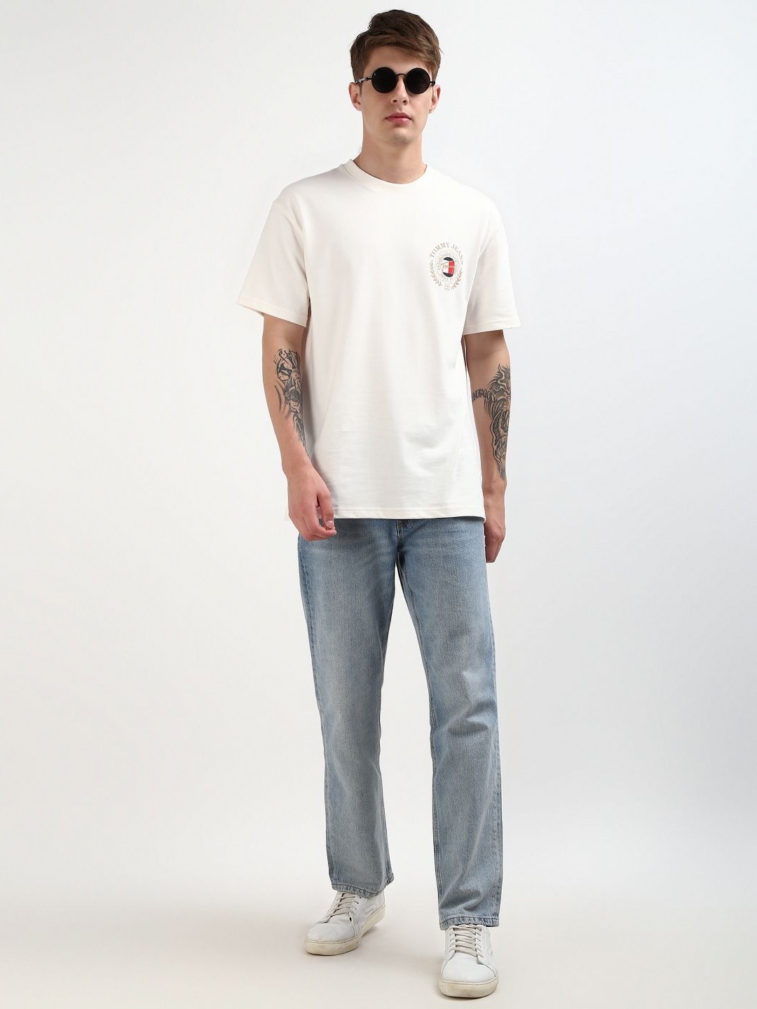 

Tommy Hilfiger Men Solid Printed Round Neck Pure Cotton T-shirt, Off white