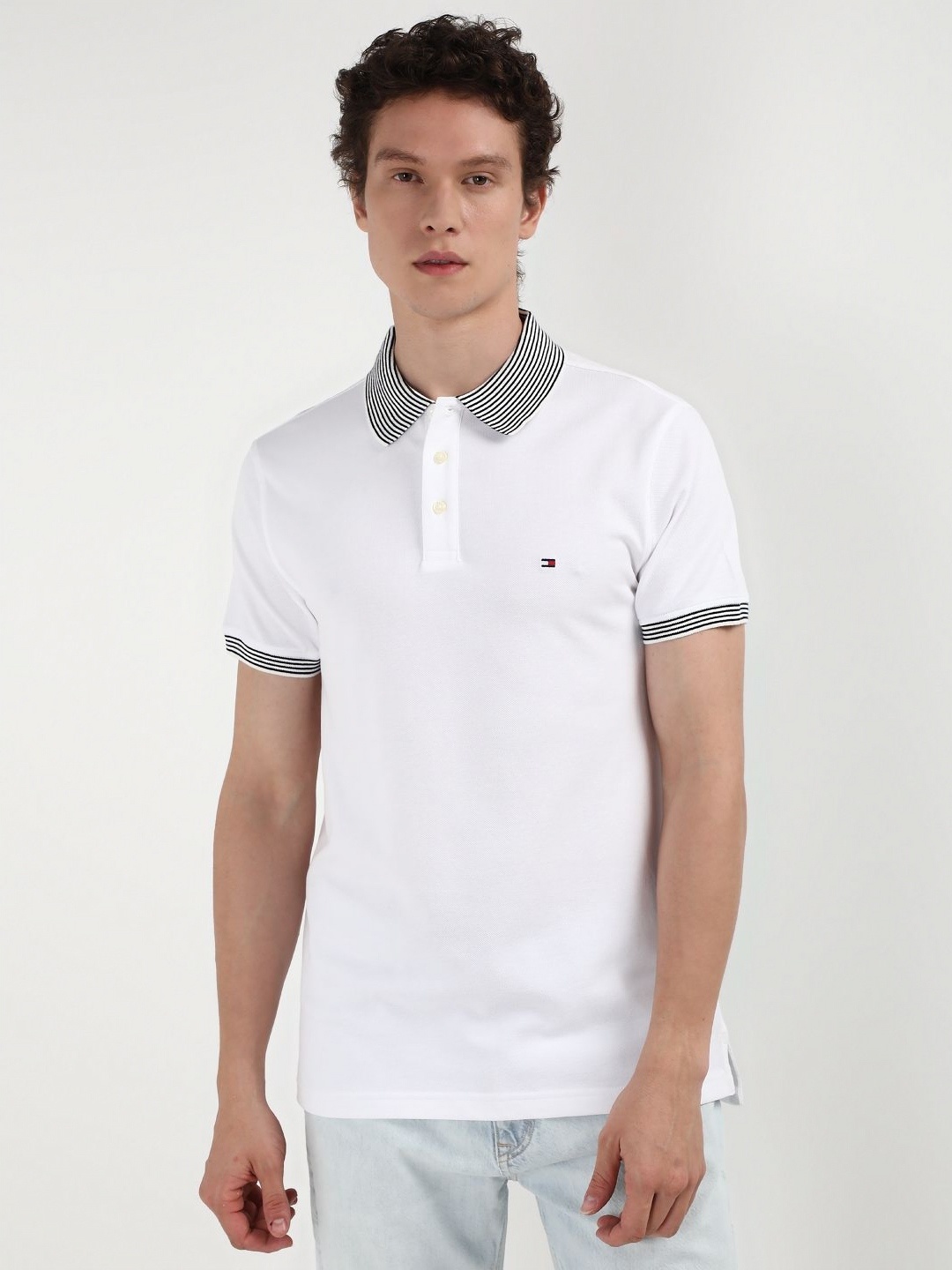 

Tommy Hilfiger Men Solid Polo Collar Organic Cotton T-shirt, White