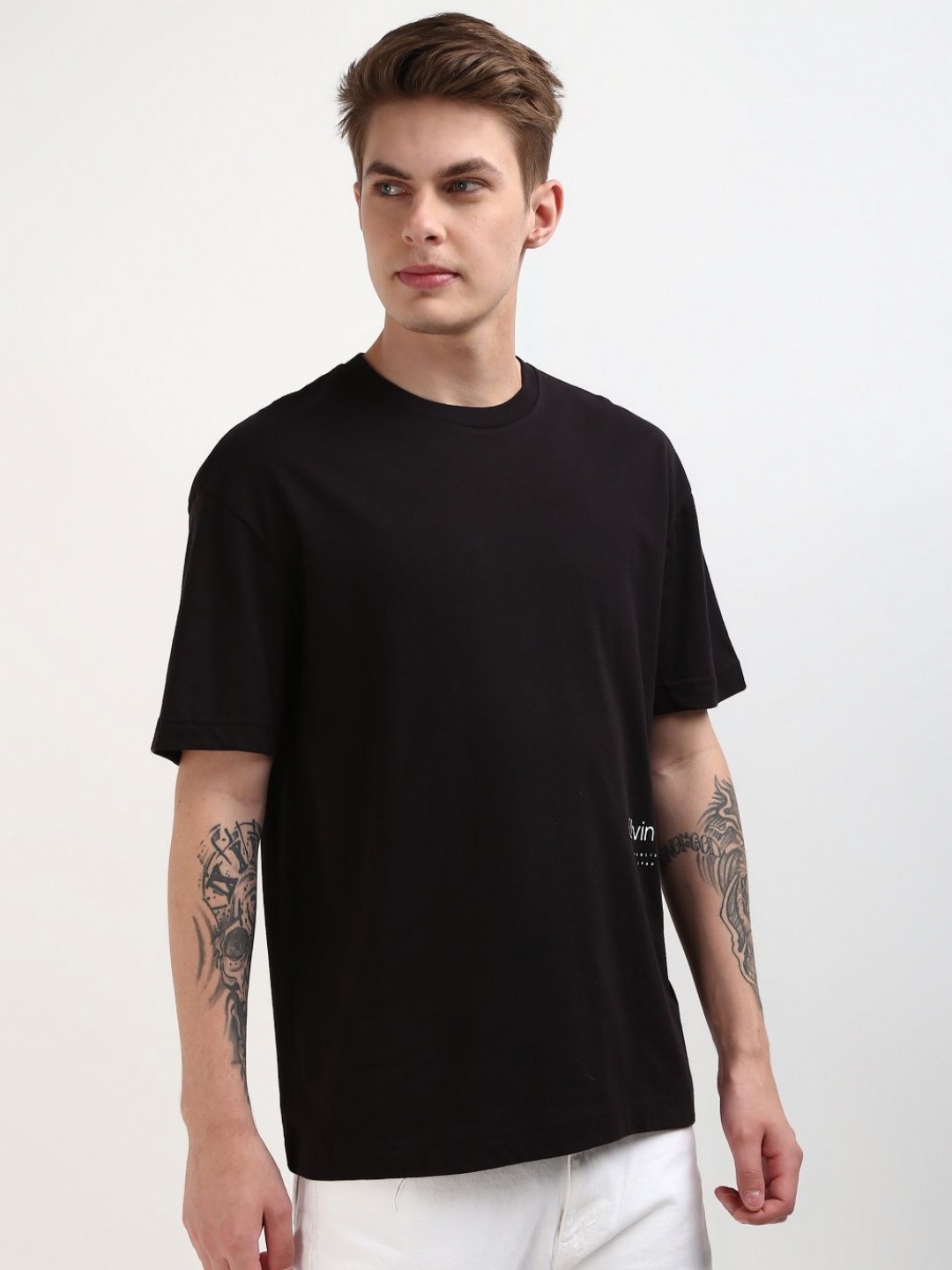 Calvin Klein Jeans Men Solid Round Neck Cotton T-Shirt, Black
