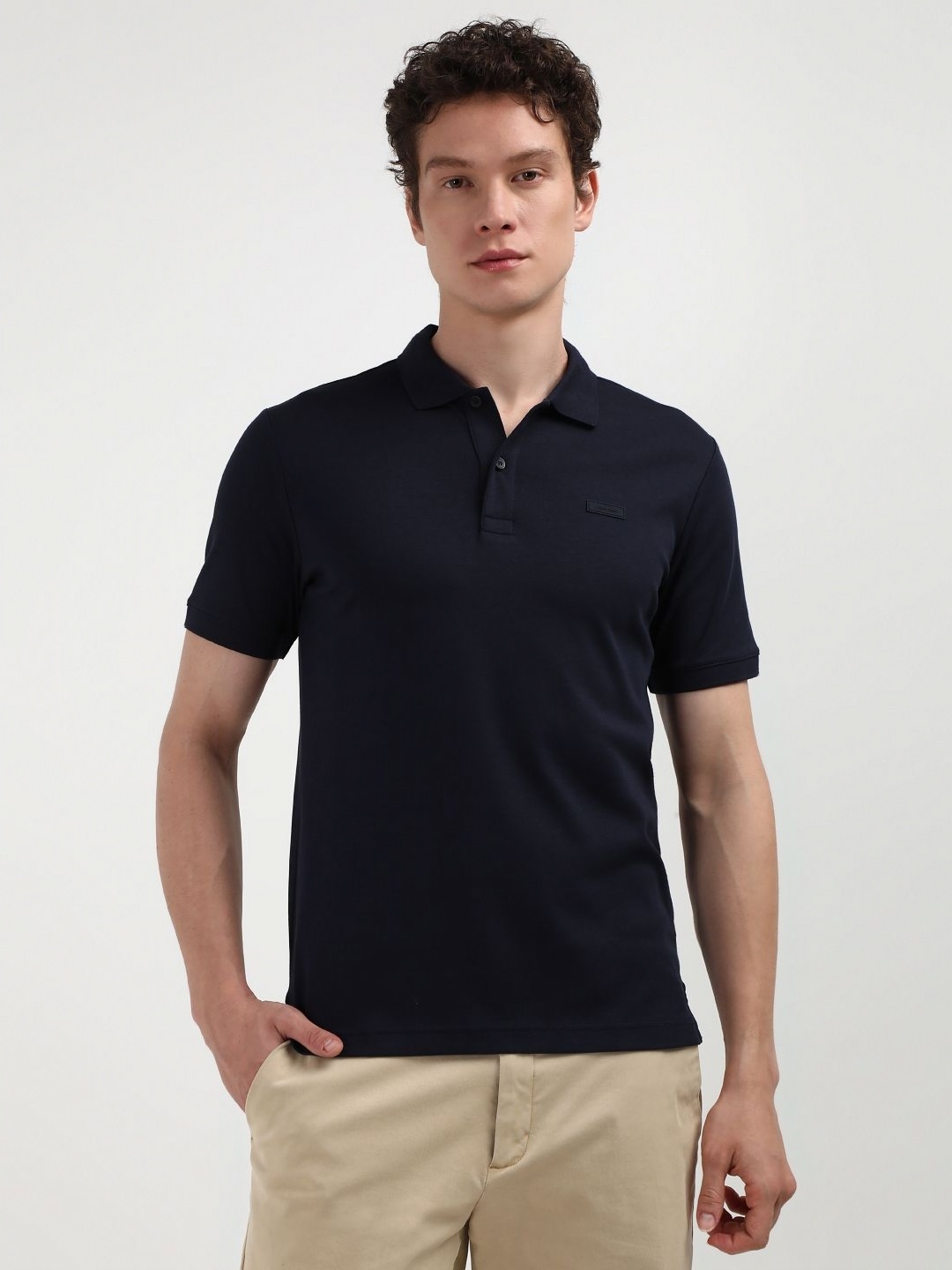 

Calvin Klein Men Solid Polo Collar Organic Cotton Slim Fit T-Shirt, Navy blue
