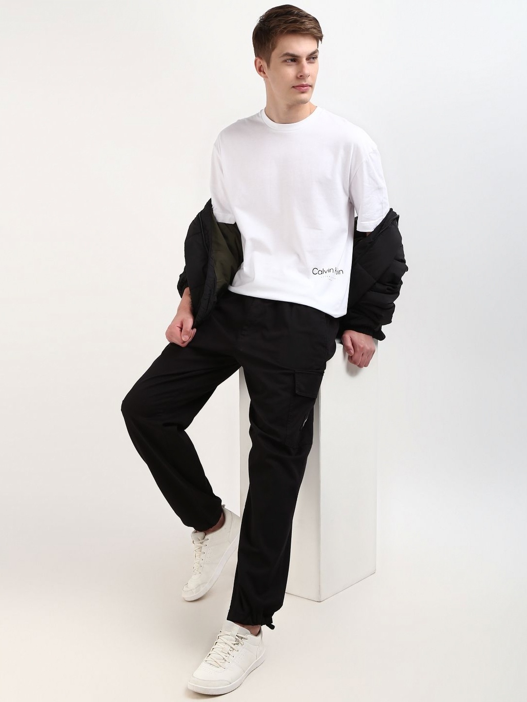 

Calvin Klein Jeans Men Solid Round Neck Cotton T-Shirt, White