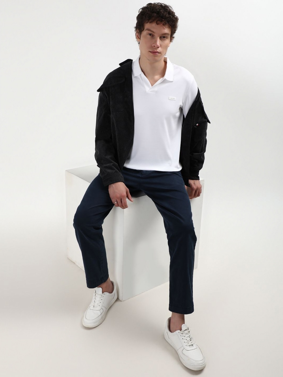 

Calvin Klein Jeans Men Solid Polo Collar Organic Cotton Slim Fit T-Shirt, White