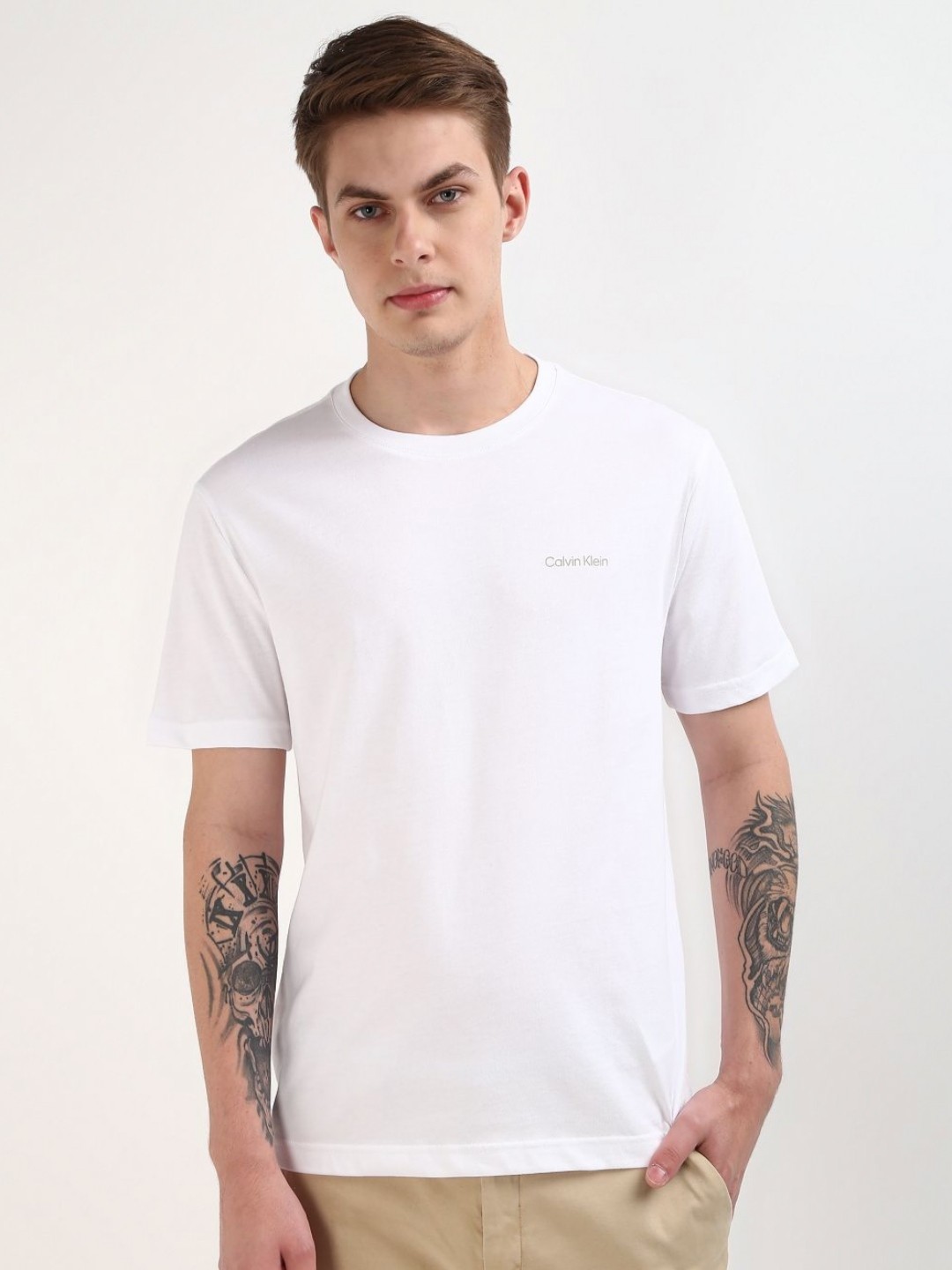 

Calvin Klein Jeans Men Solid Round Neck Cotton T-Shirt, White