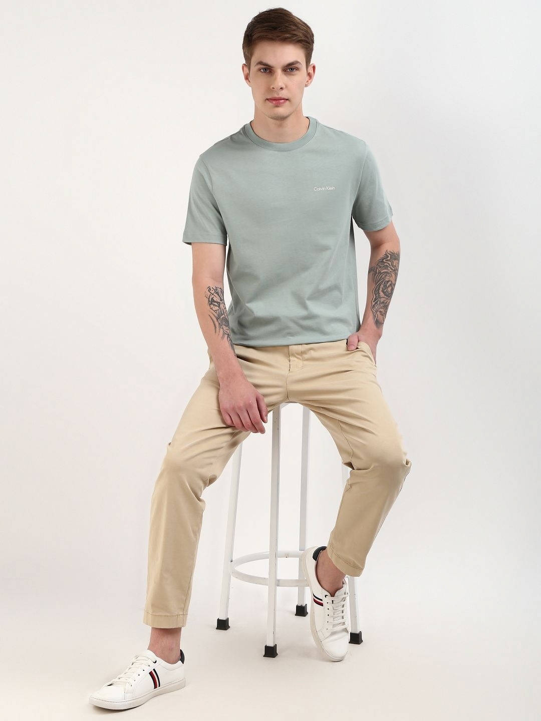 

Calvin Klein Jeans Men Solid Round Neck Cotton T-Shirt, Grey