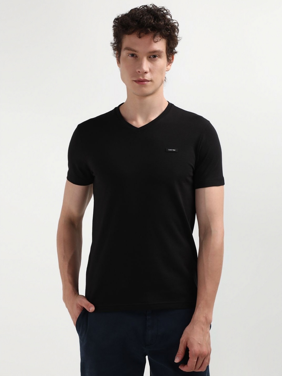 

Calvin Klein Jeans Men Solid Round Neck Cotton Slim Fit T-Shirt, Black