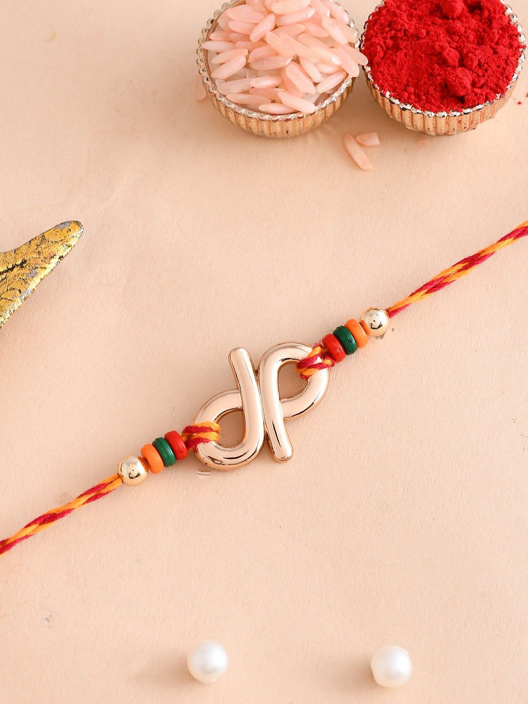 

Aapno Rajasthan Beaded Thread Rakhi with Roli Chawal & Greetings Card, Gold