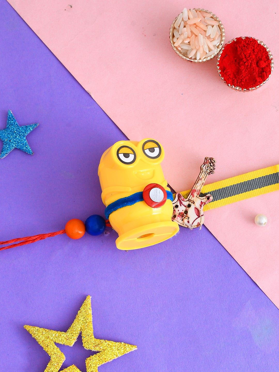 

Aapno Rajasthan Minions Thread Rakhi With Roli Chawal & Greeting Card, Yellow