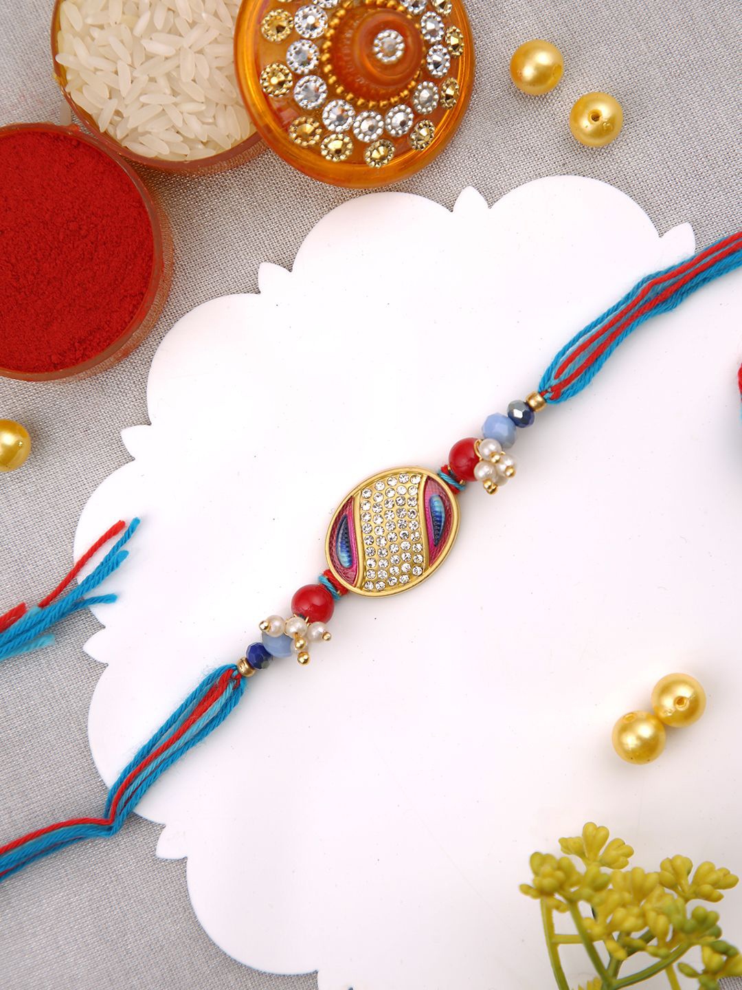 

Aapno Rajasthan Beaded Thread Rakhi, Blue