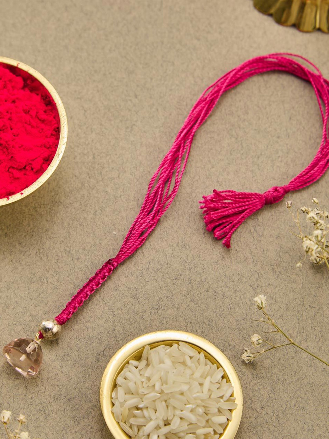 

Fabindia Thread Rakhi With Roli Chawal, Pink