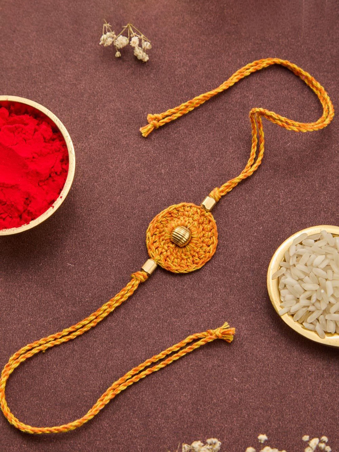 

Fabindia Thread Rakhi With Roli Chawal, Yellow