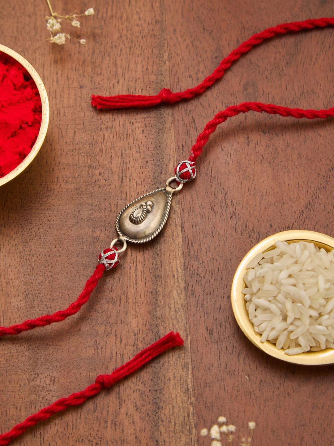 

Fabindia Thread Rakhi With Roli Chawal, Gold