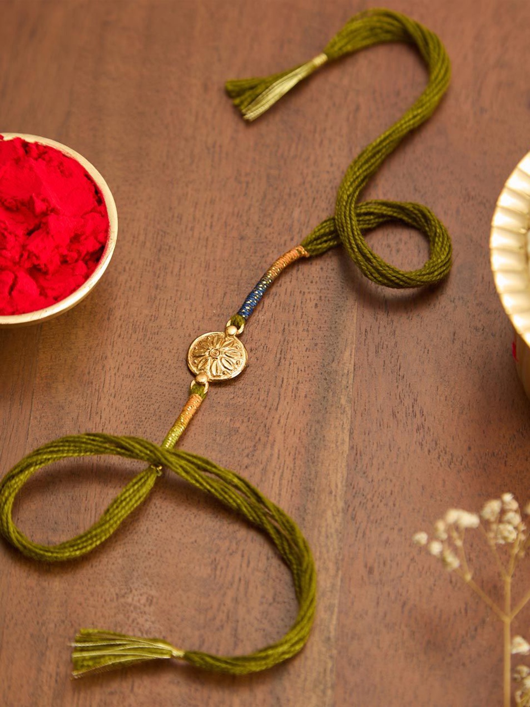 

Fabindia Thread Rakhi With Roli Chawal, Gold