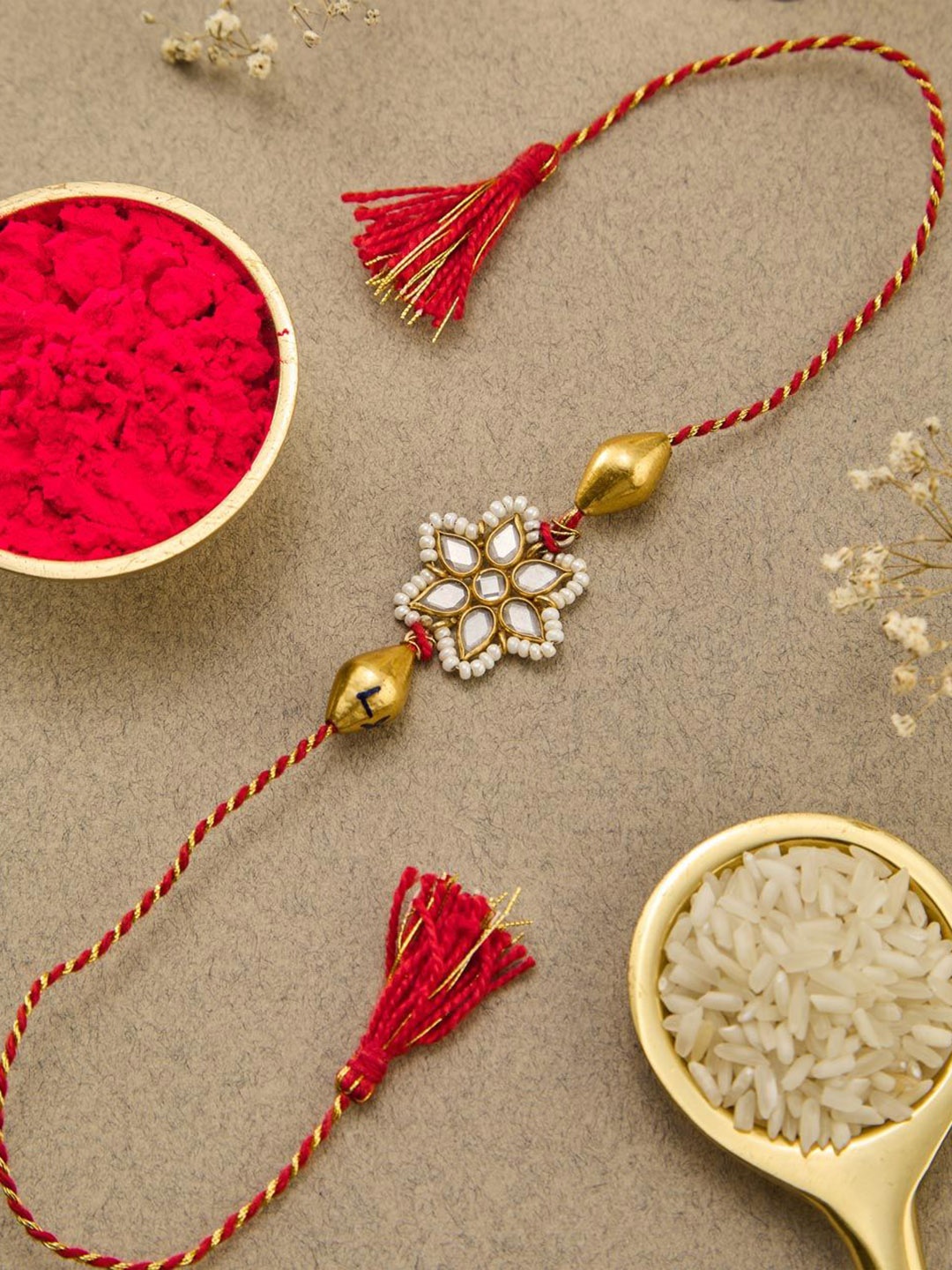 

Fabindia Beaded Thread Rakhi, Red