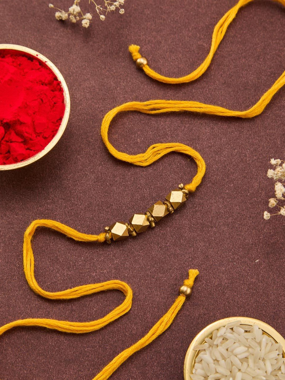 

Fabindia Beaded Thread Rakhi, Gold