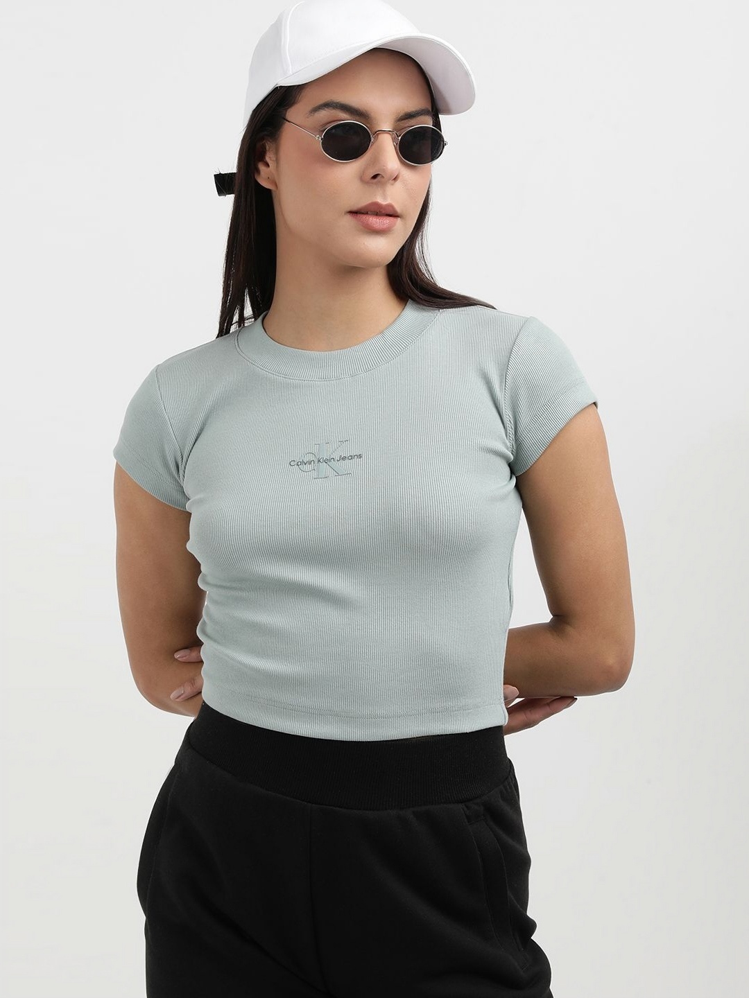 

Calvin Klein Women Solid Slim Fit T-shirt, Grey