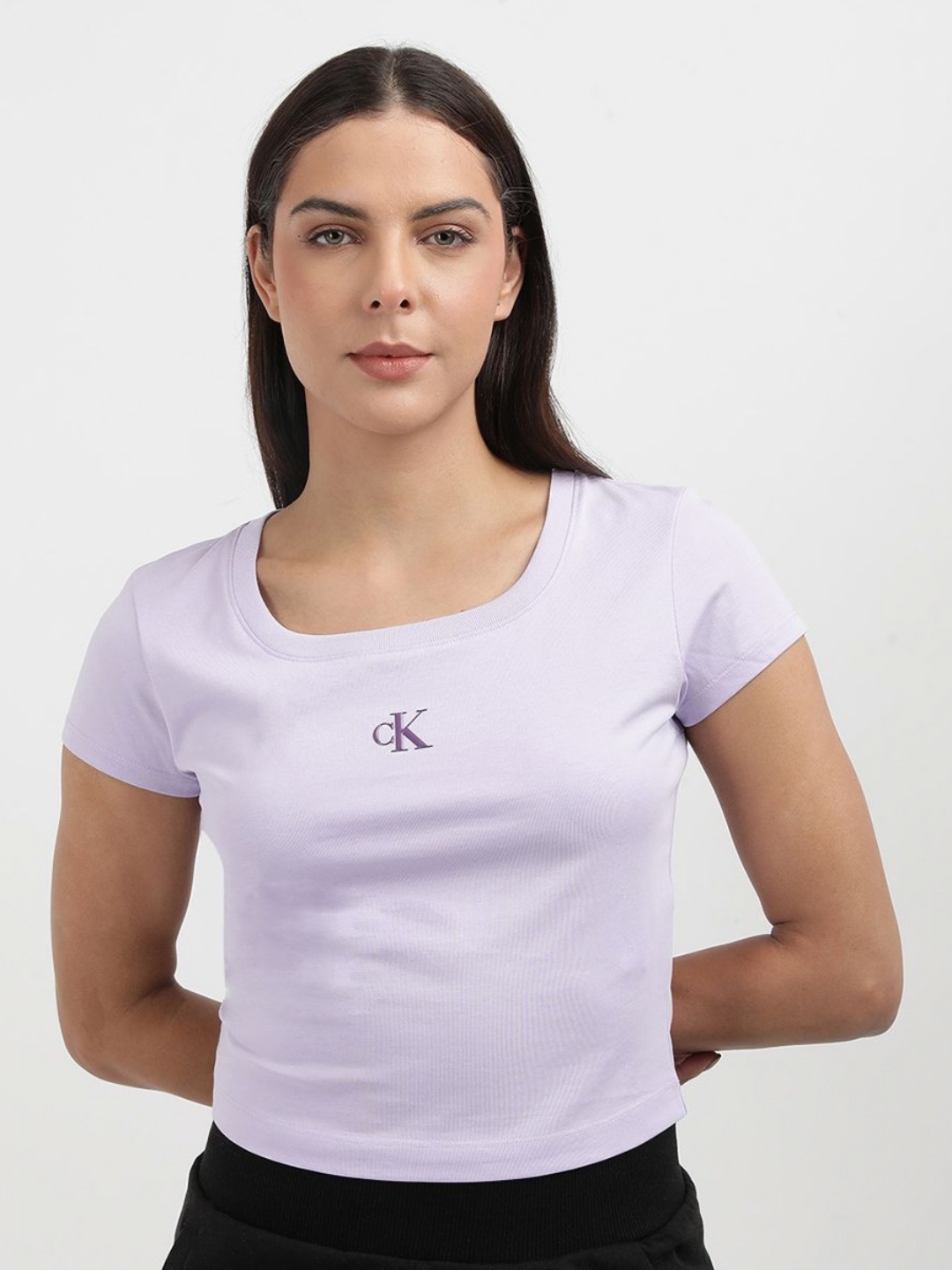 

Calvin Klein Women Solid Round Neck Slim Fit T-shirt, Purple