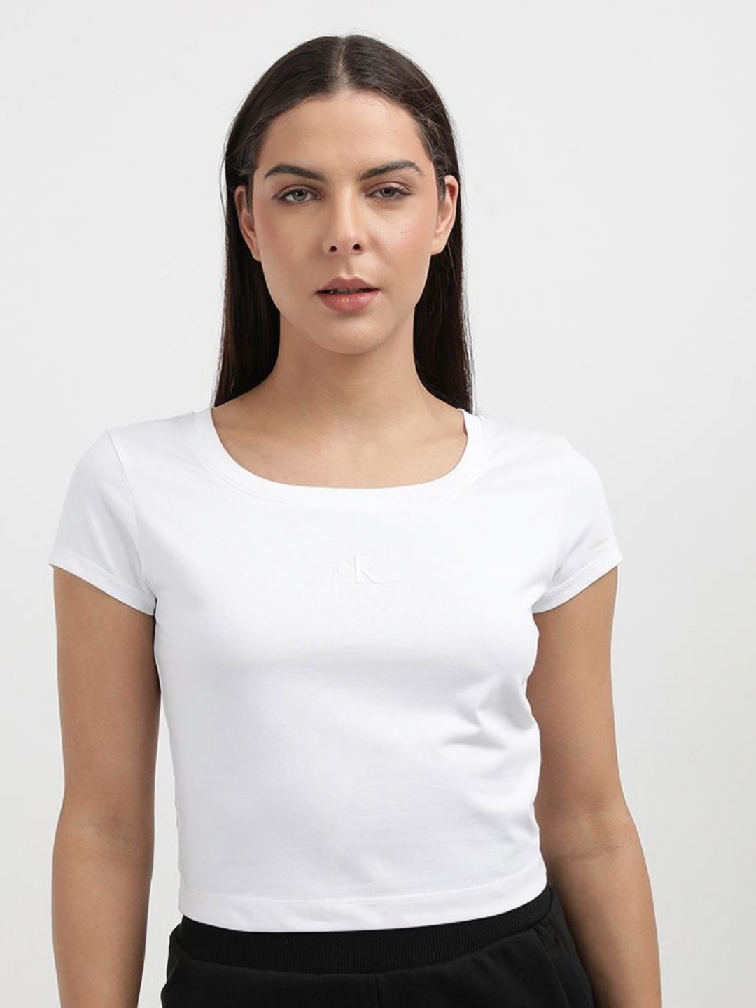 

Calvin Klein Women Solid Round Neck Slim Fit T-shirt, White
