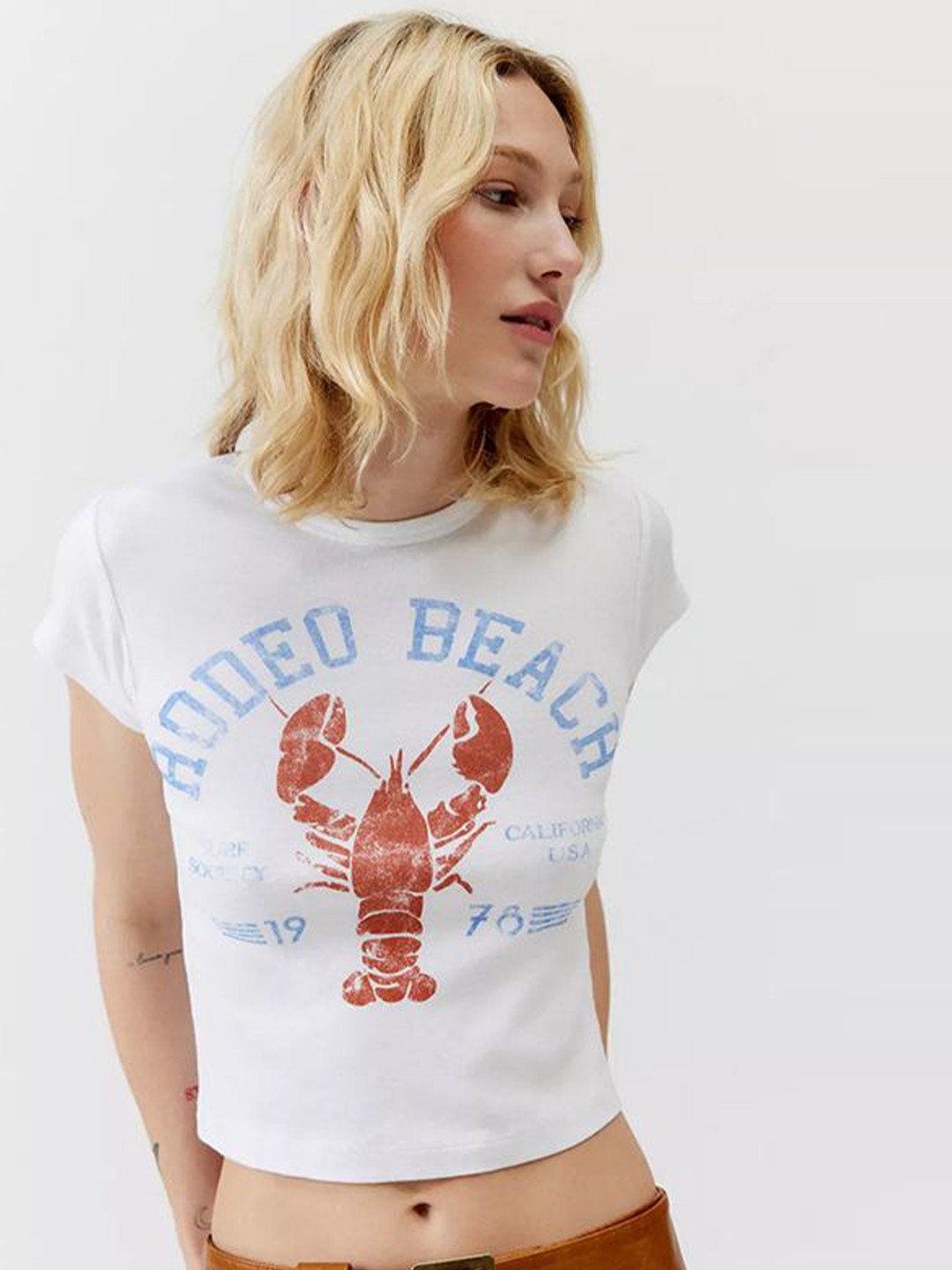 

StyleCast x Revolte Graphic print Top, White