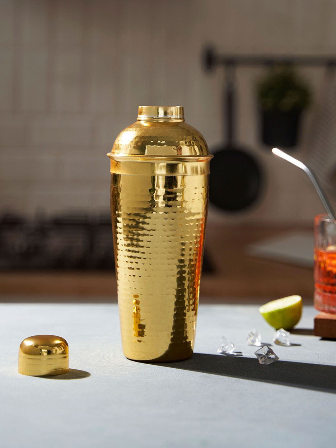 

DecorTwist Gold toned Textured Stainless Steel Cocktail Shaker