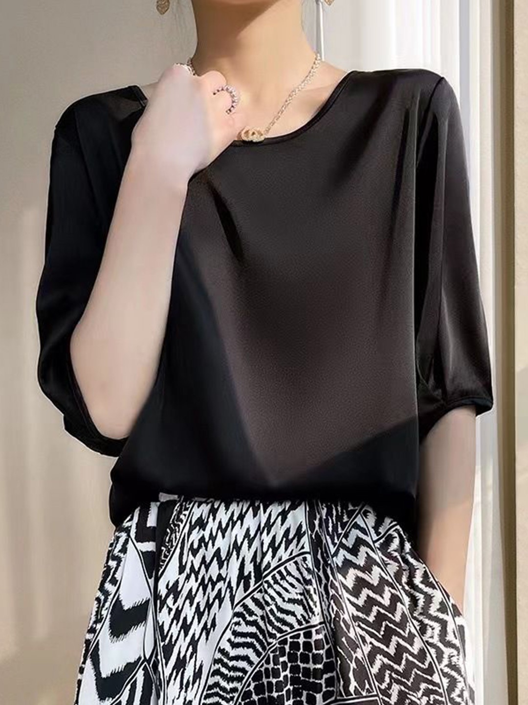 

StyleCast Women Solid Black Round Neck Satin Top