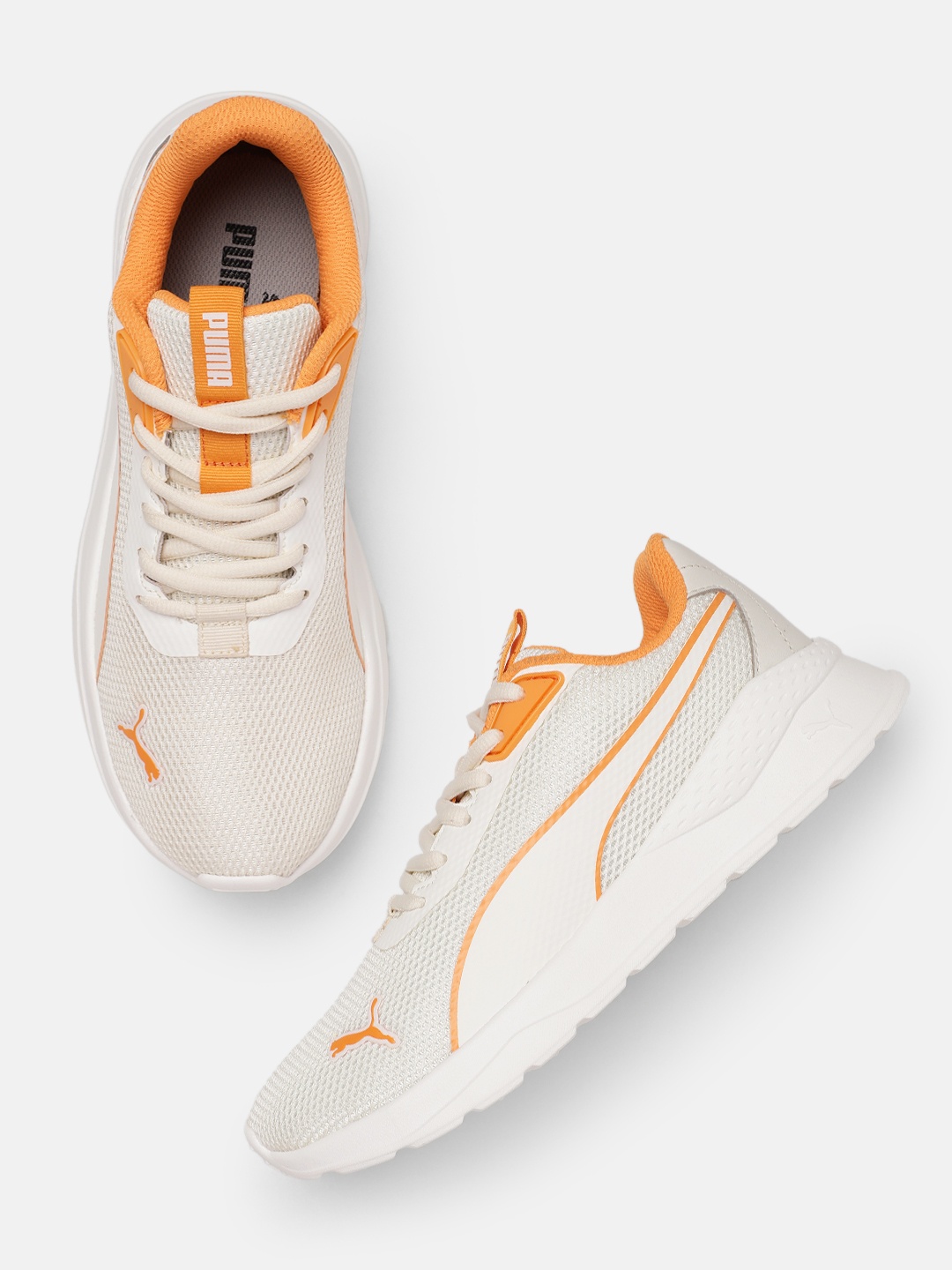 

Puma Women NovaRush Sneakers, Off white