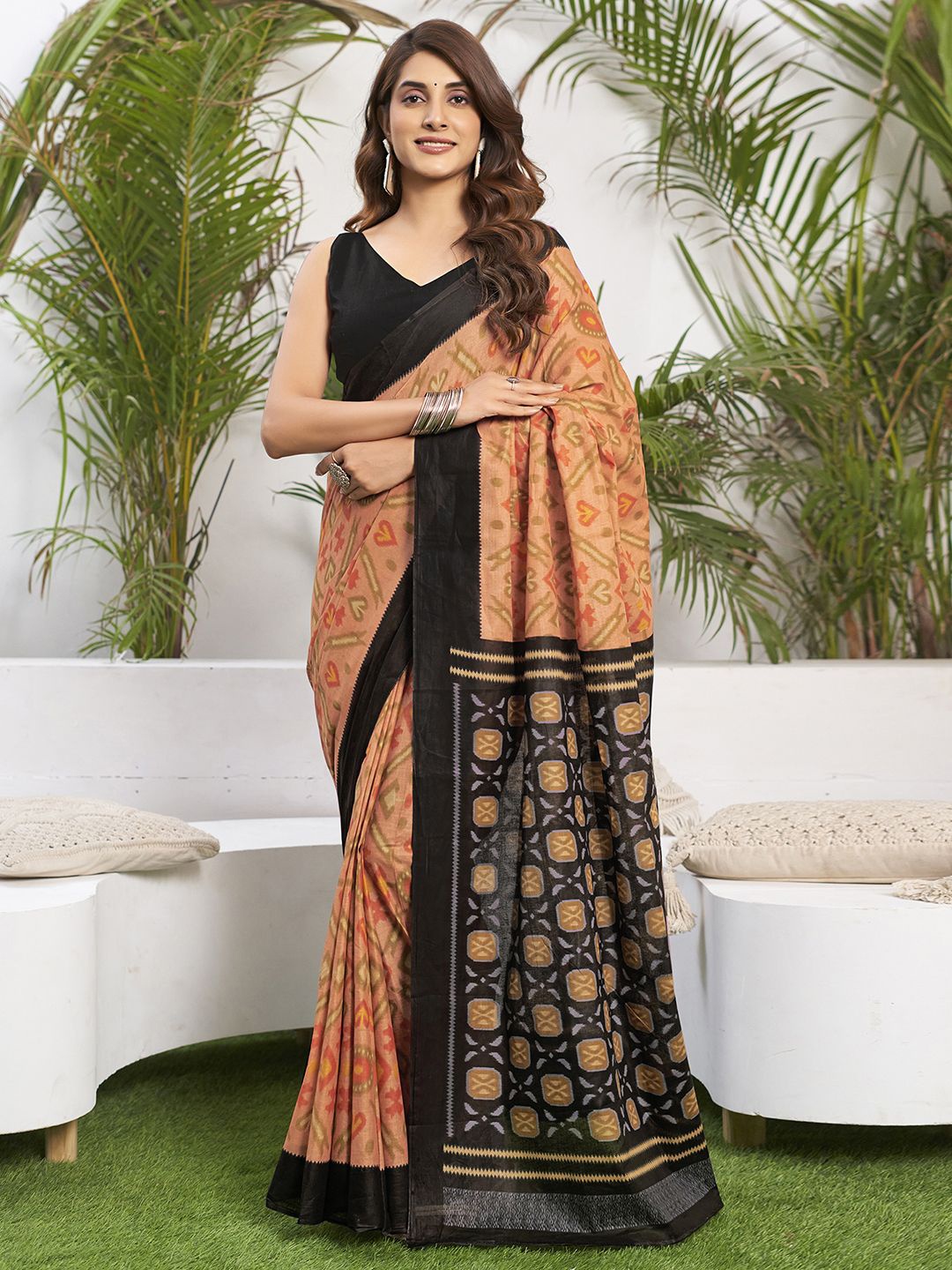 

Mitera Solid Border Ikkat Saree, Black