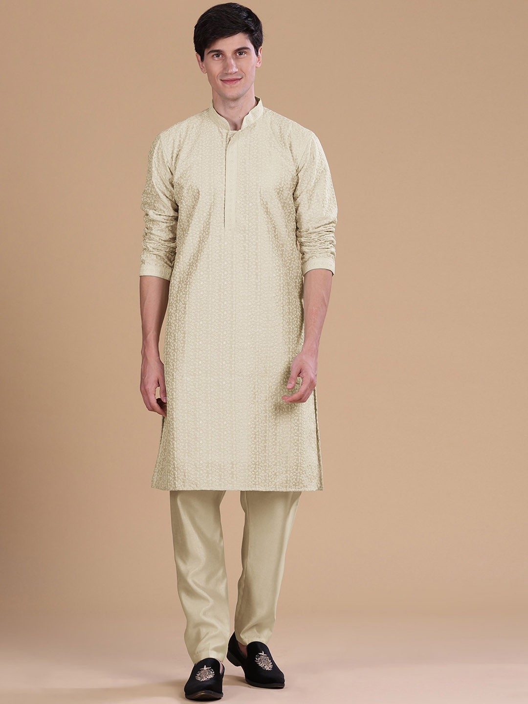 

Anouk Cream Coloured Ethnic Motifs Embroidered Straight Thread Work Kurta with Pyjamas