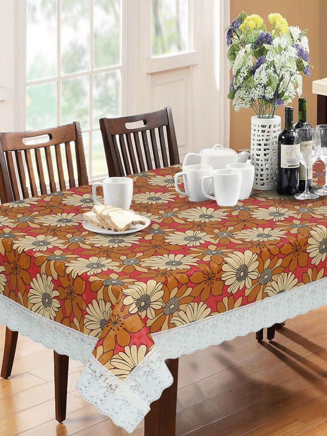 

Dakshya Industries Orange & Beige Floral Waterproof 6-Seater Table Cover