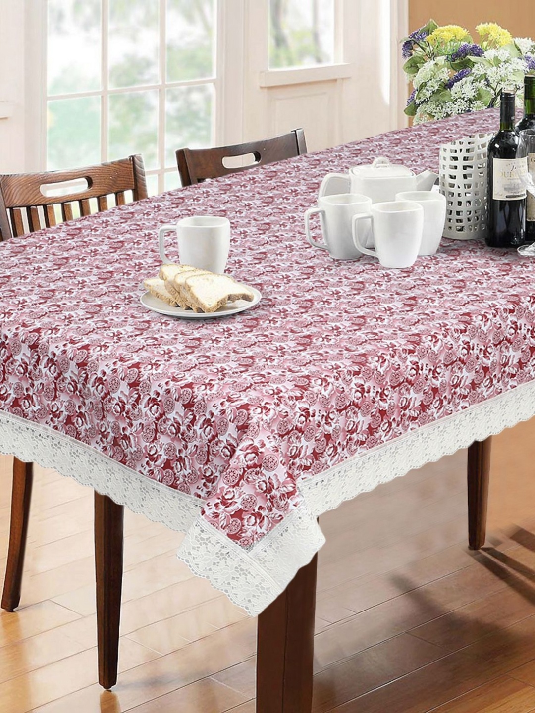 

Dakshya Industries Pink & White Floral Rectangle Waterproof 6-Seater Table Cover