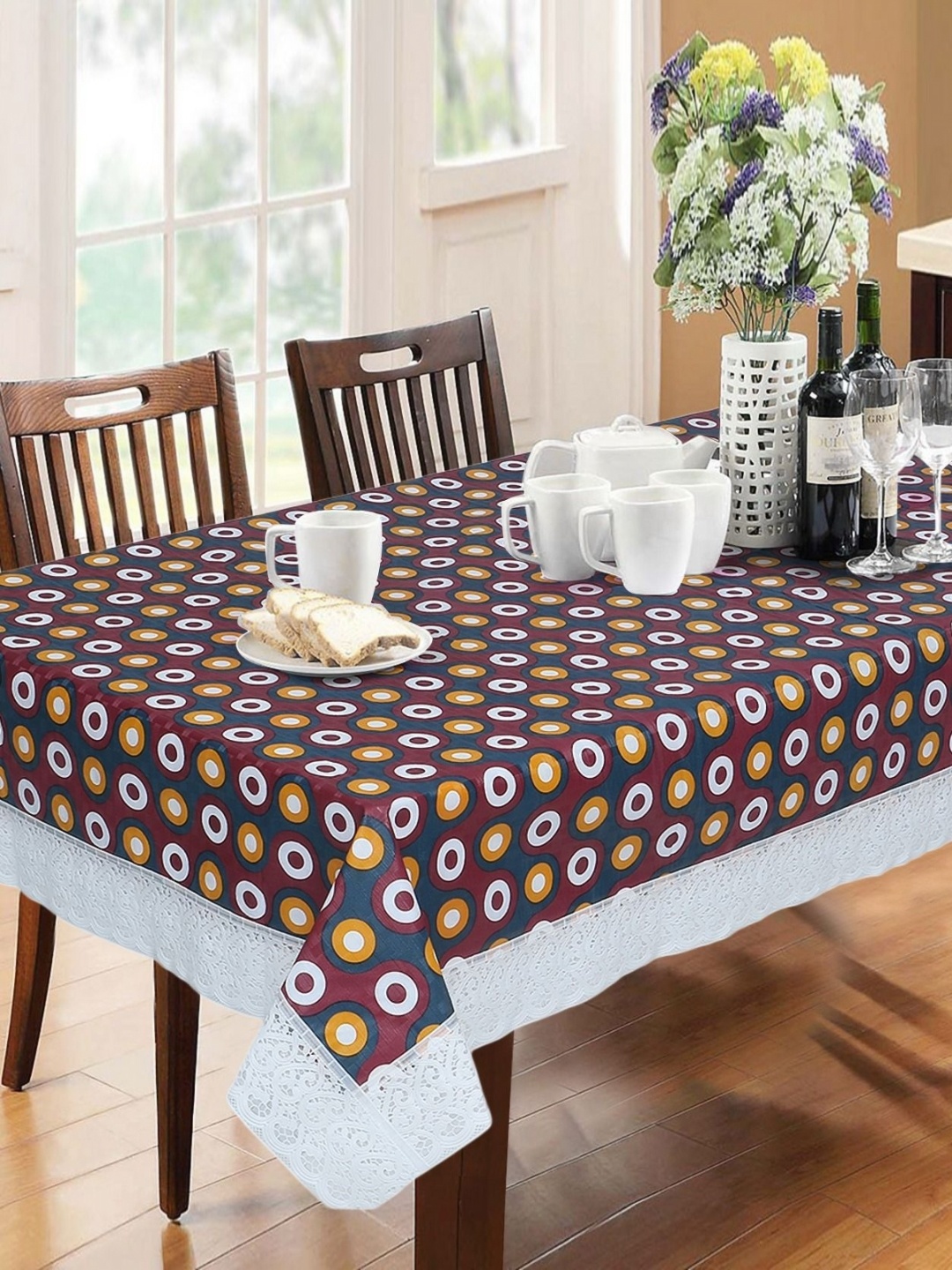 

Dakshya Industries Yellow & White Geometric Printed Waterproof 6-Seater Table Cover