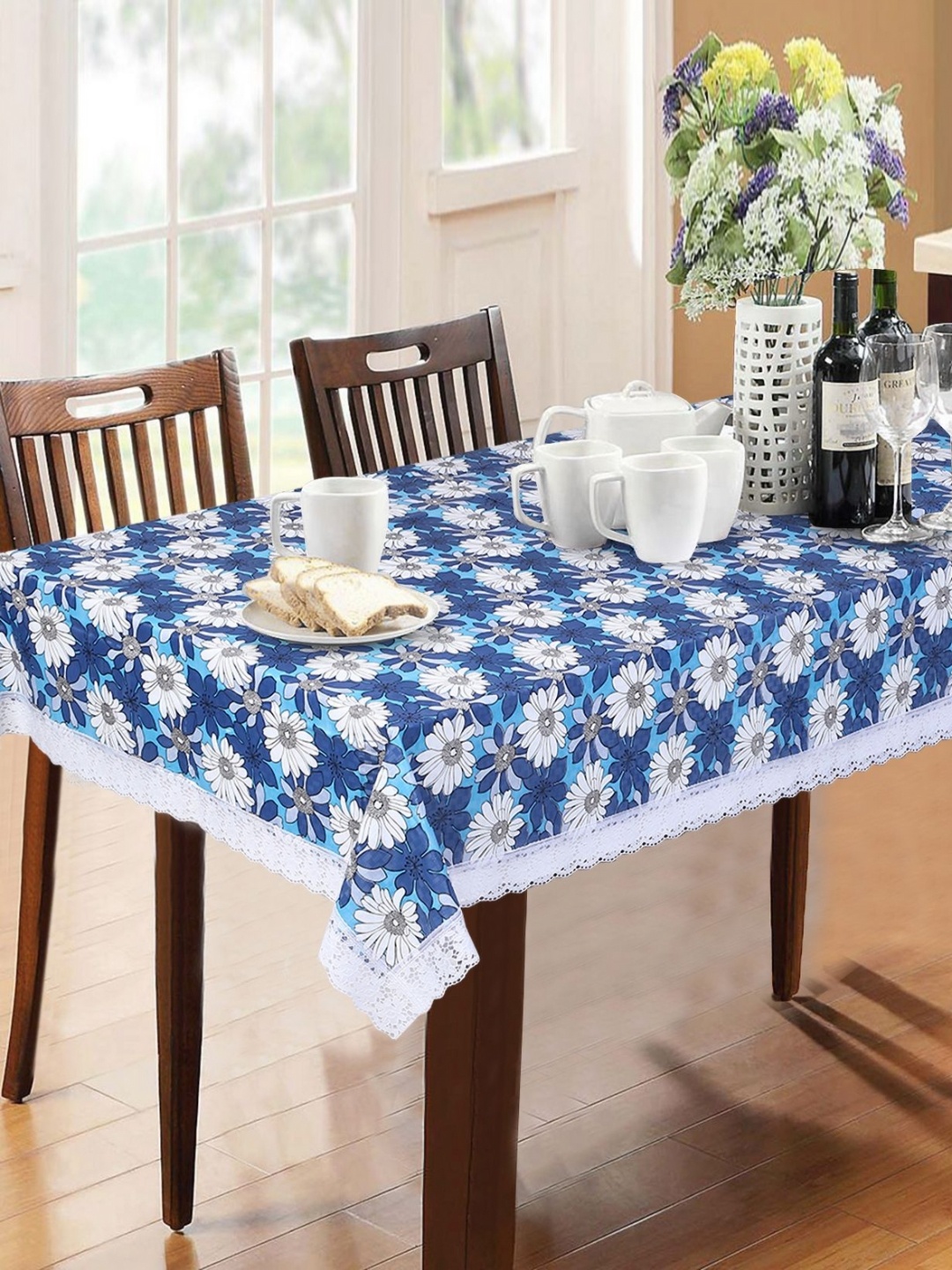 

Dakshya Industries Blue & White Floral Waterproof 6-Seater Table Cover