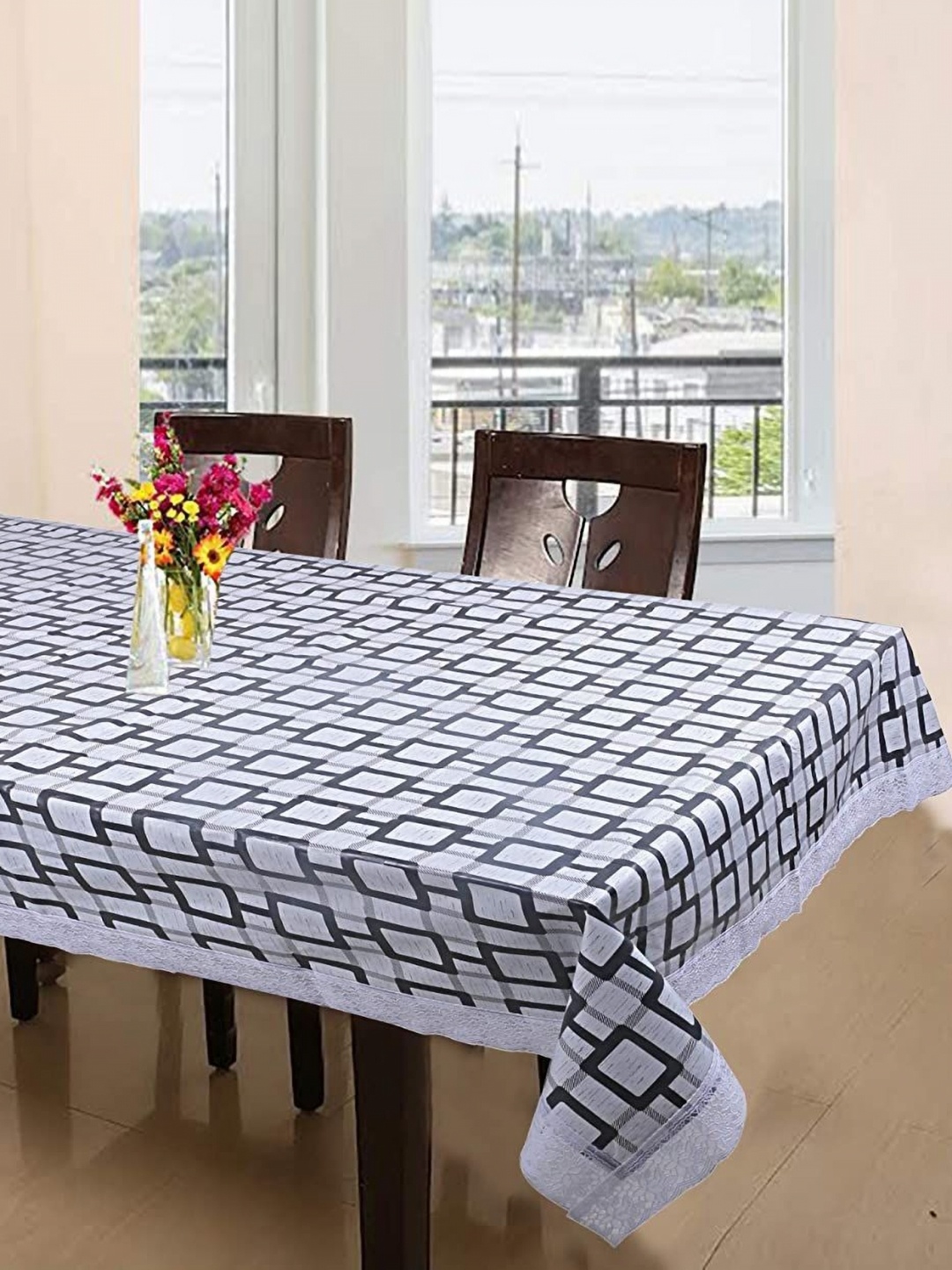 

Dakshya Industries White & Black Geometric Printed Waterproof 6-Seater Table Cover