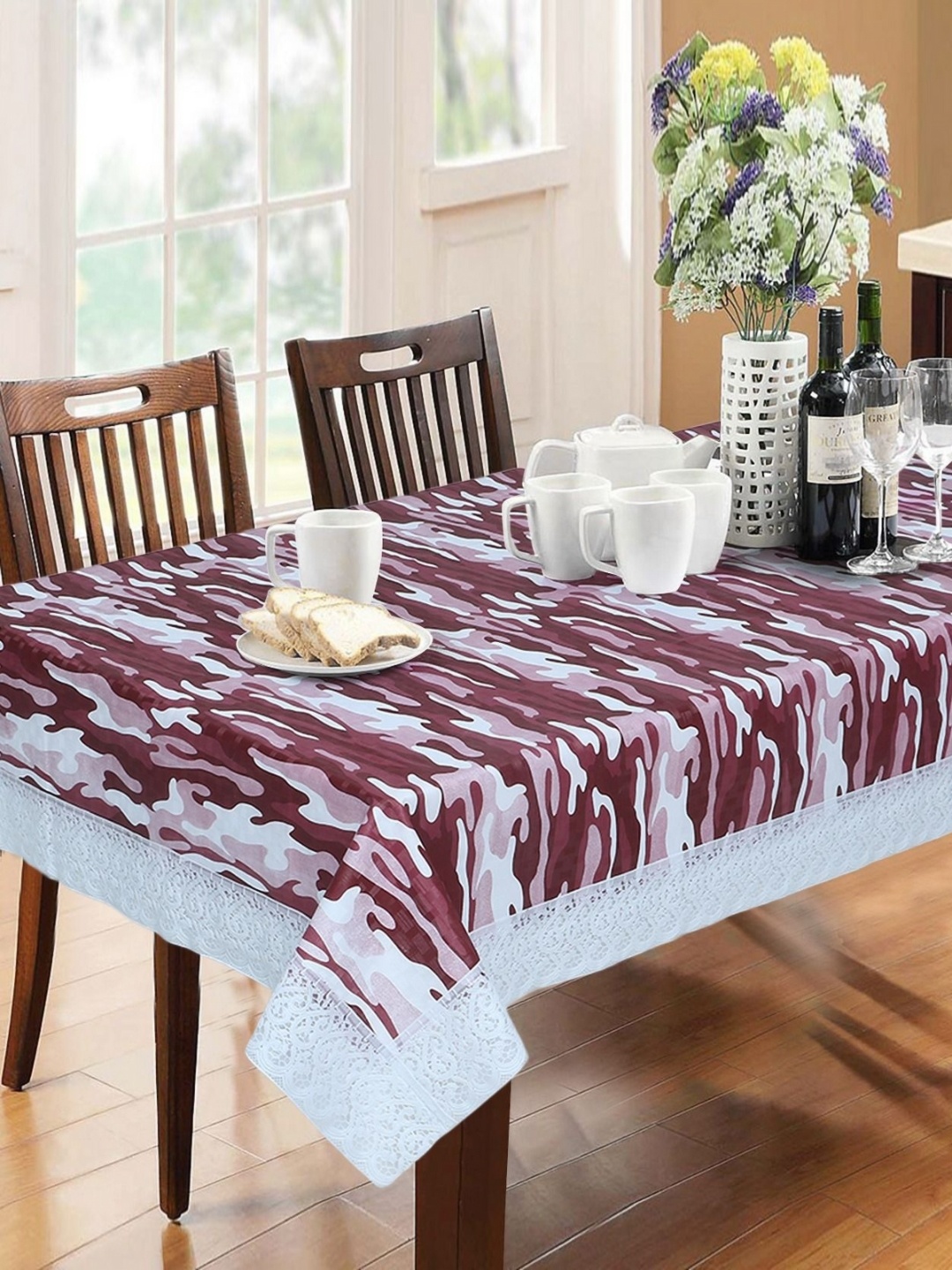 

Dakshya Industries Rust & White Geometric Printed Waterproof 6-Seater Table Cover