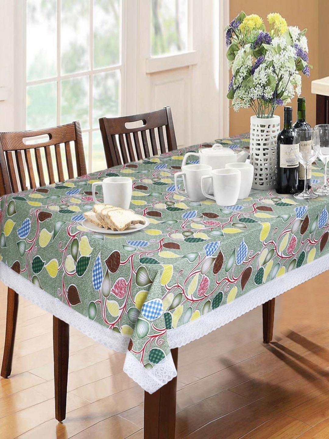 

Dakshya Industries Green & Yellow Floral Waterproof Plastic 6-Seater Table Cover