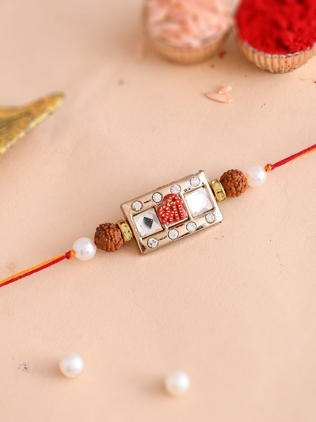 

Aapno Rajasthan American Diamond-Studded & Beaded Thread Rakhi, White