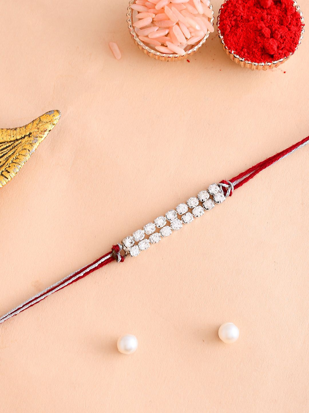 

Aapno Rajasthan Stone-Studded Thread Rakhi, Silver