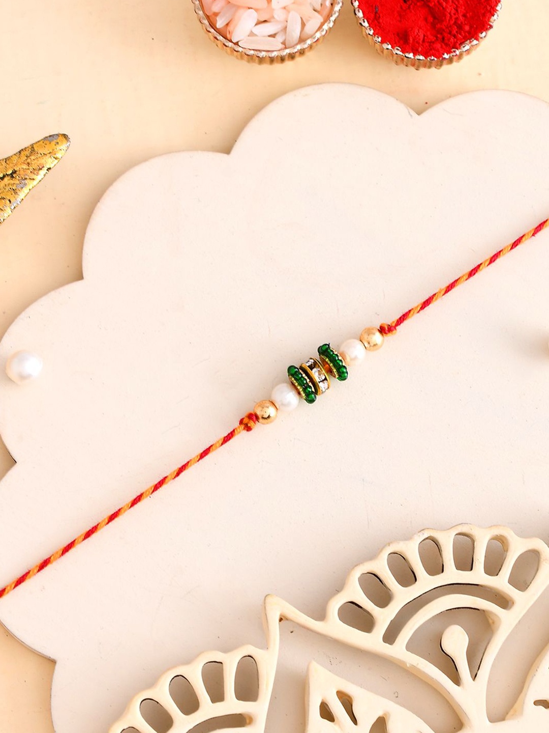 

Aapno Rajasthan American Diamond-Studded & Beaded Thread Rakhi, Green