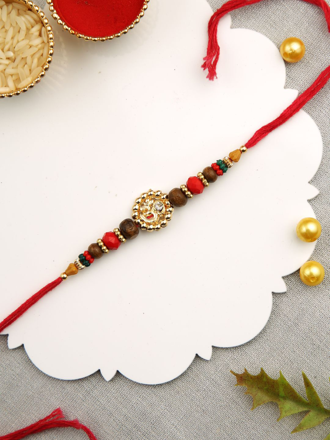 

Aapno Rajasthan American Diamond-Studded & Beaded Thread Rakhi, Red