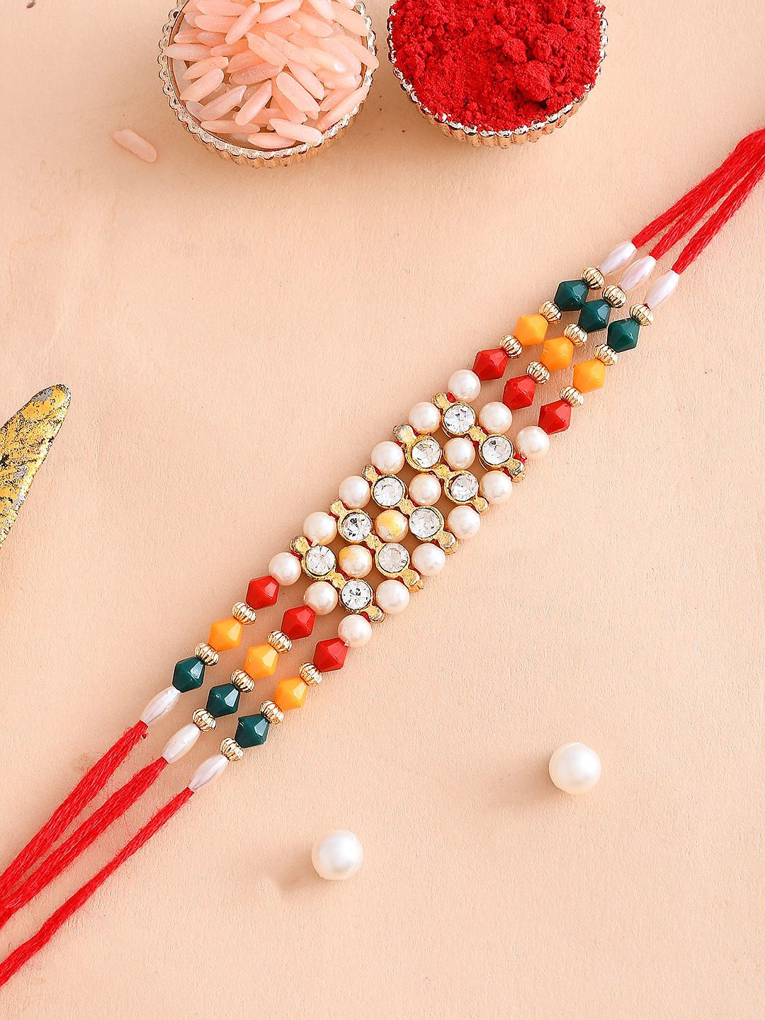 

Aapno Rajasthan American Diamond-Studded & Beaded Thread Rakhi, Red