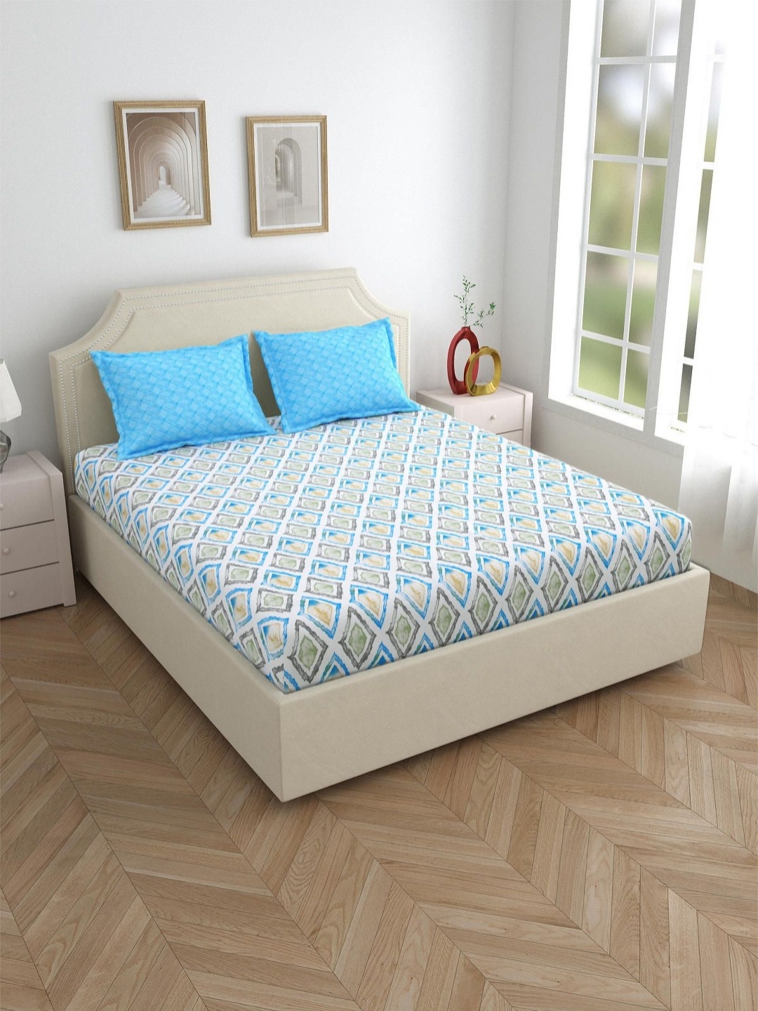 

Salona Bichona Blue & White Printed 144 TC Cotton Fitted King Bedsheet & 2 Pillow Cover