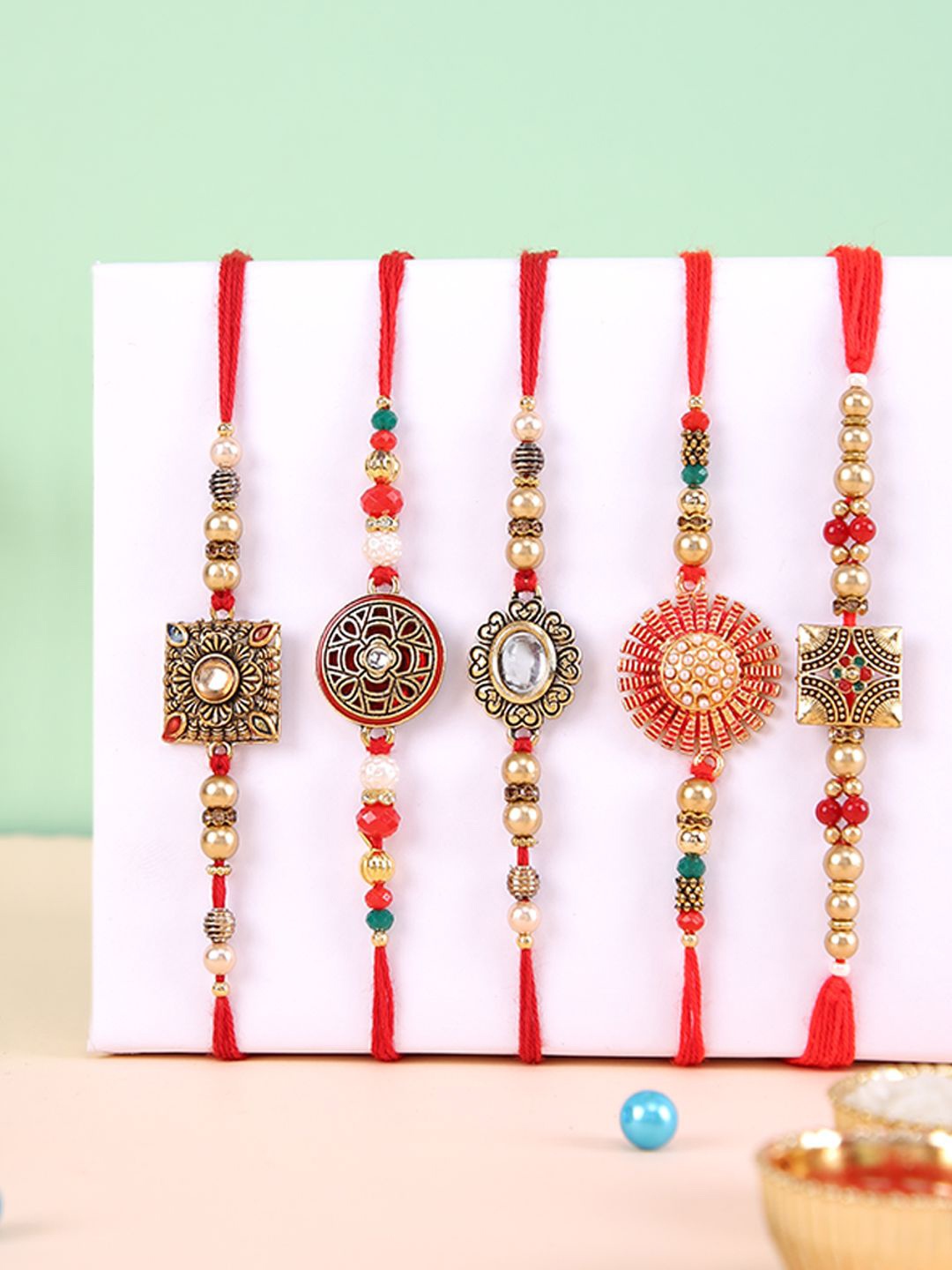 

Aapno Rajasthan Set of 5 Kundan-Studded & Beaded Thread Rakhi, Red