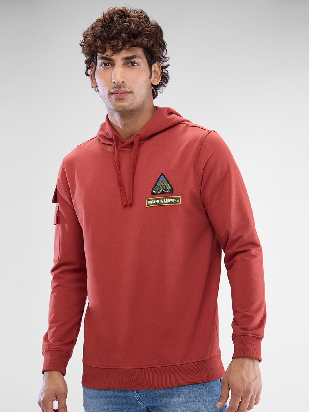 

SPYKAR Men Solid Hooded Sweatshirt, Red