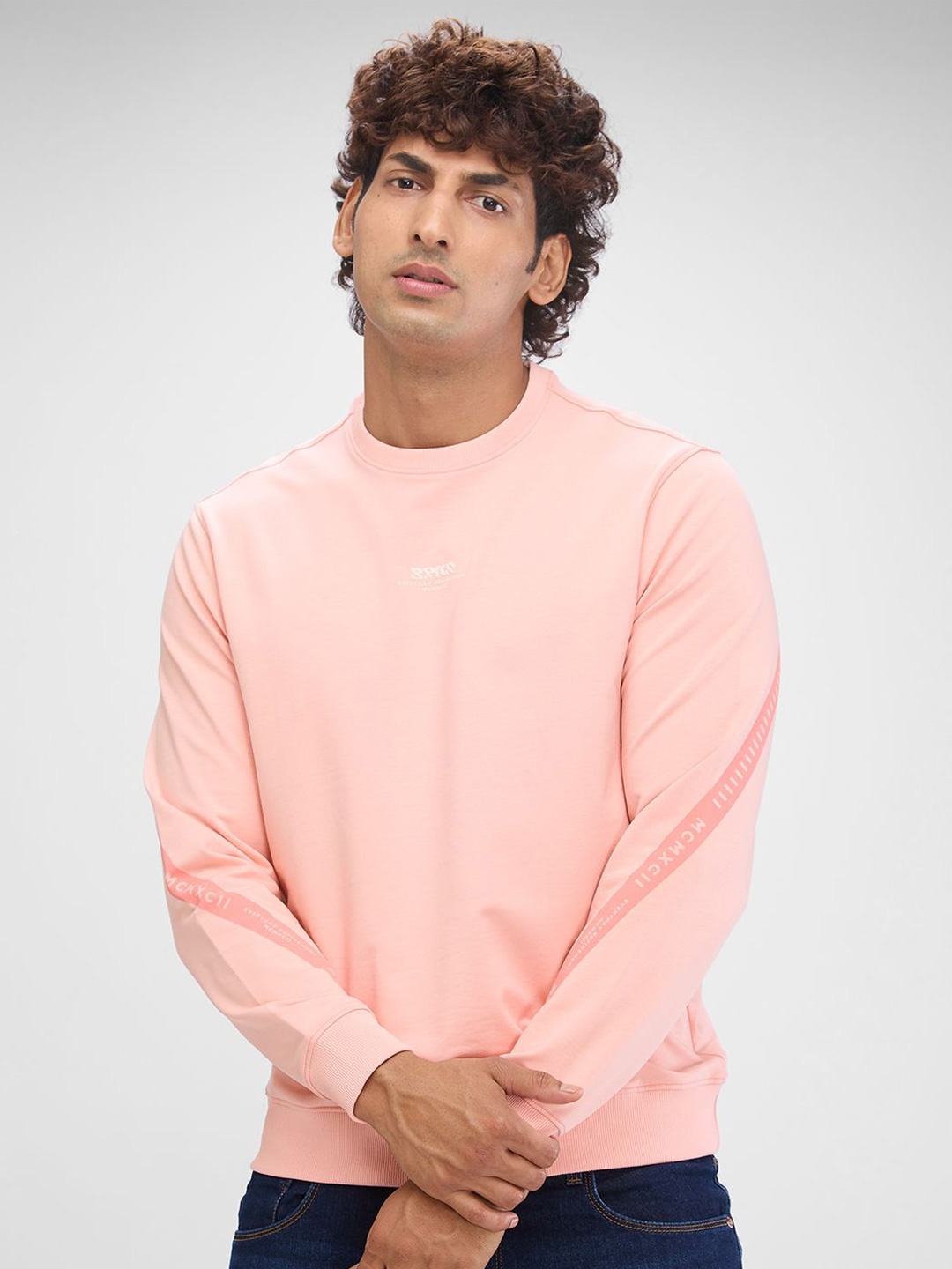 

SPYKAR Men Solid Hooded Sweatshirt, Pink