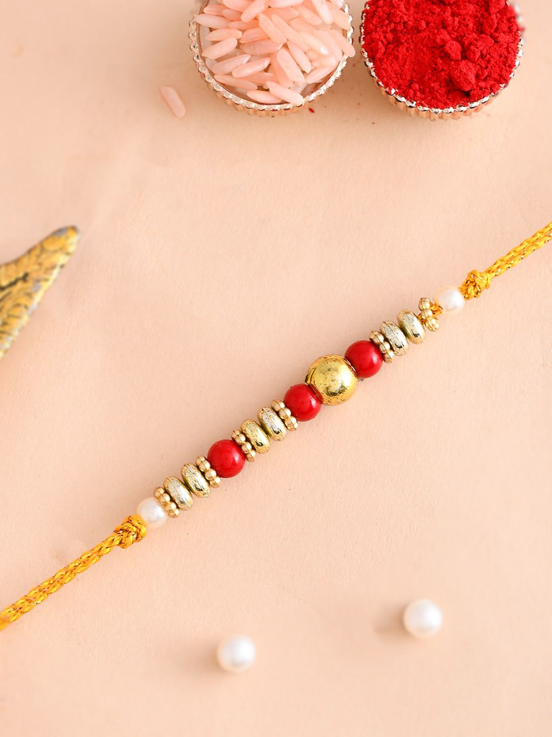 

Aapno Rajasthan Beaded Thread Rakhi, Red