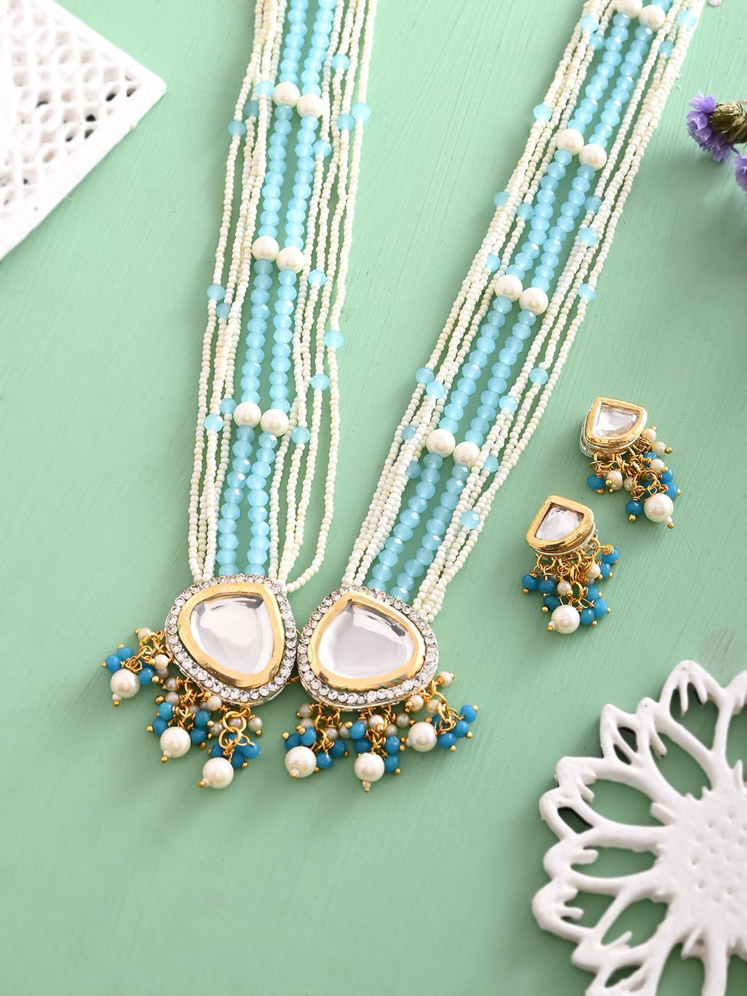

Silvermerc Designs Gold Plated Kundan Studded & Pearls Beaded Jewellery Set
