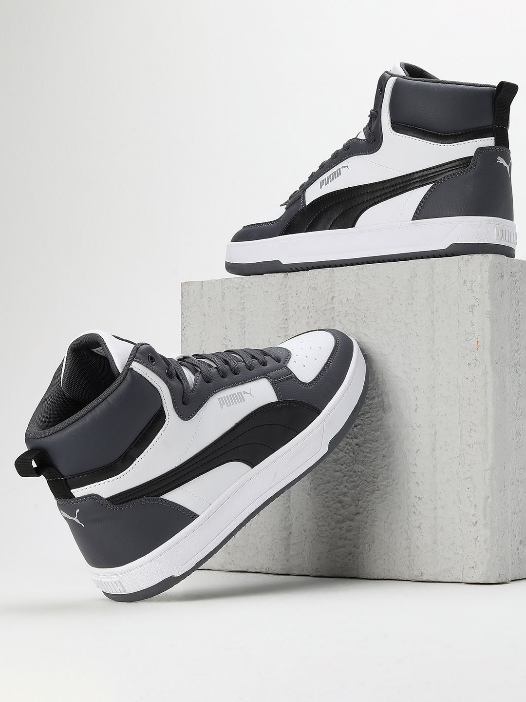 

Puma Unisex Caven 2.0 Mid Sneakers, White