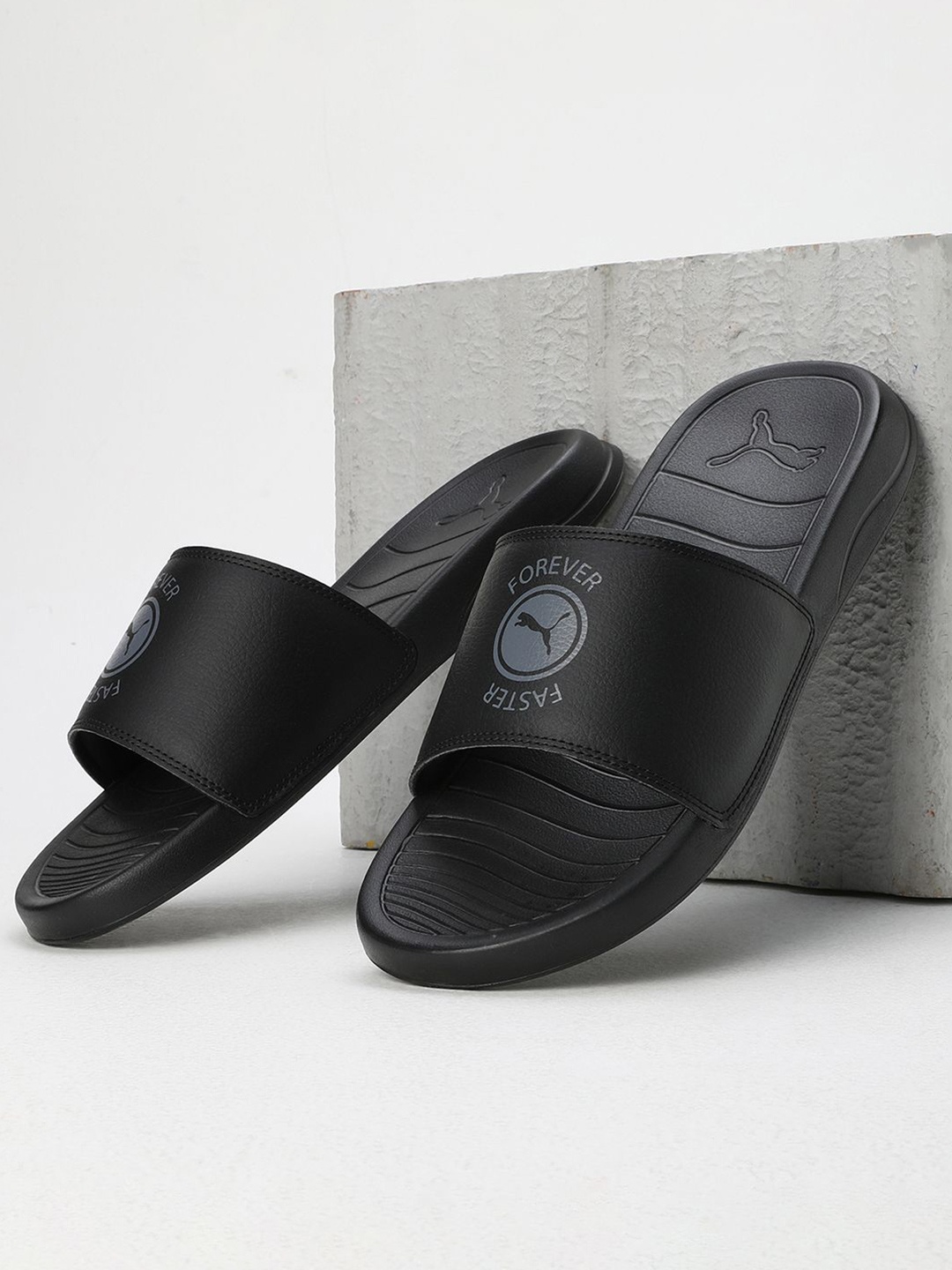 

Puma Unisex Xerxes Slides, Black