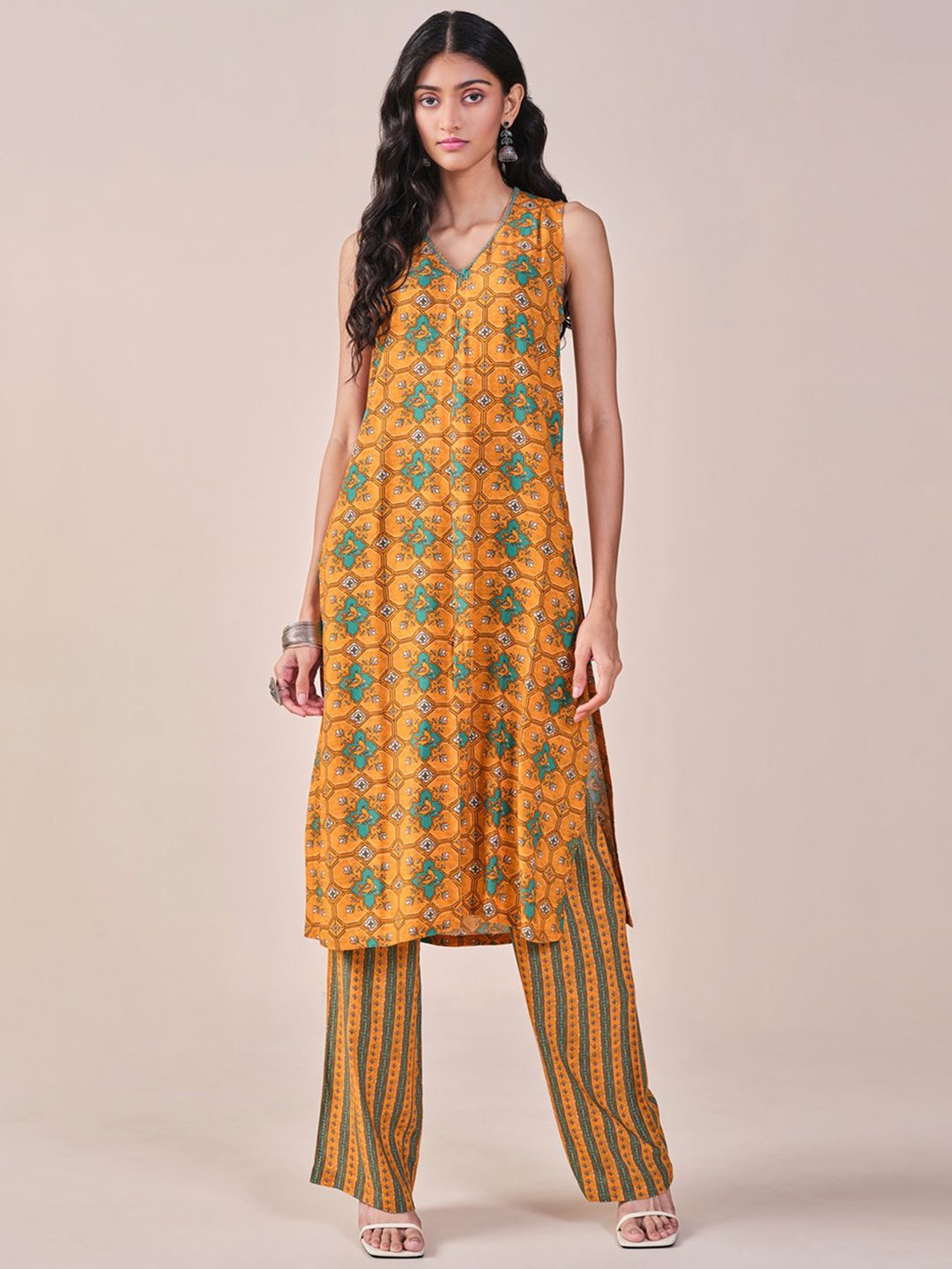 

Global Desi Floral Printed Kurta with Palazzos, Mustard